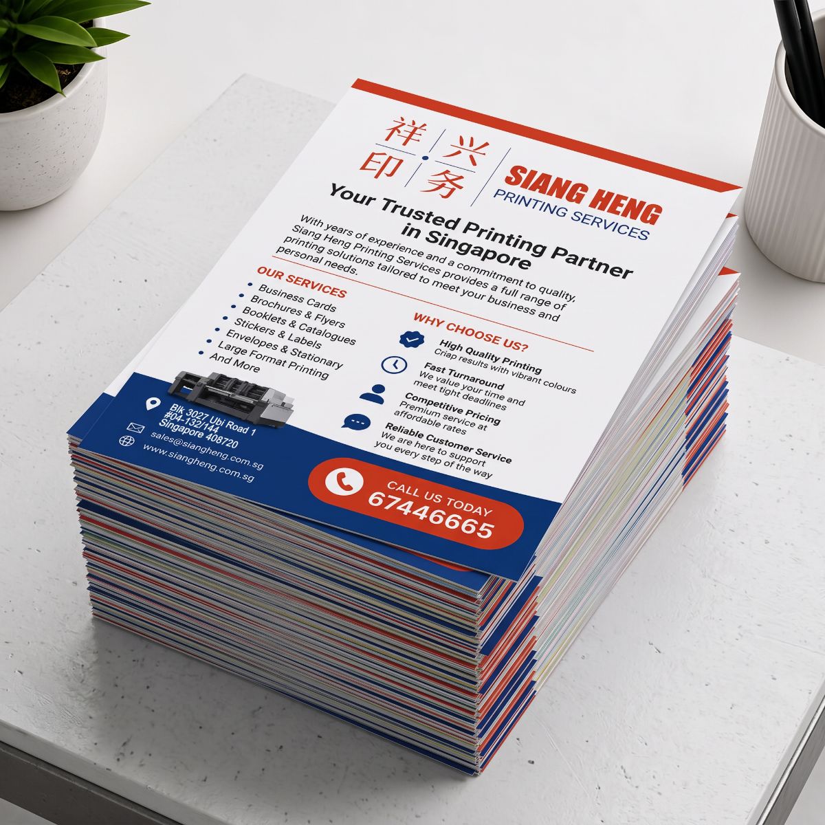 Stack of offset flyer printing samples by Siang Heng Printing Services Singapore